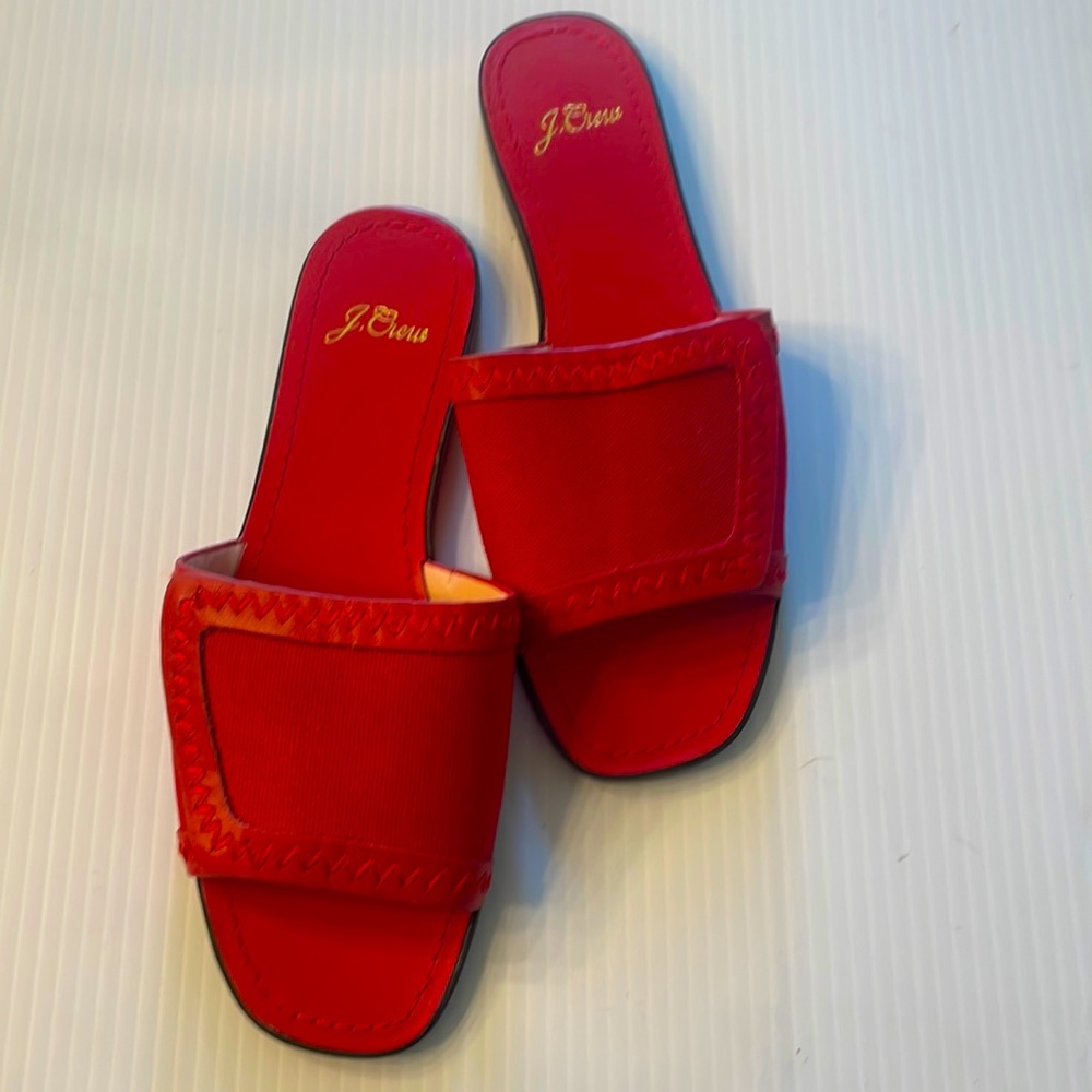 Red slide sandal.